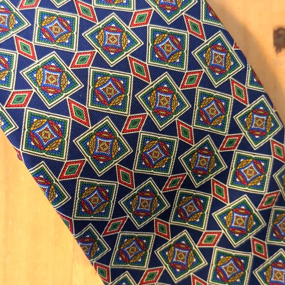 J. Crew 100 percent silk neck tie brown red blue gold Geometric